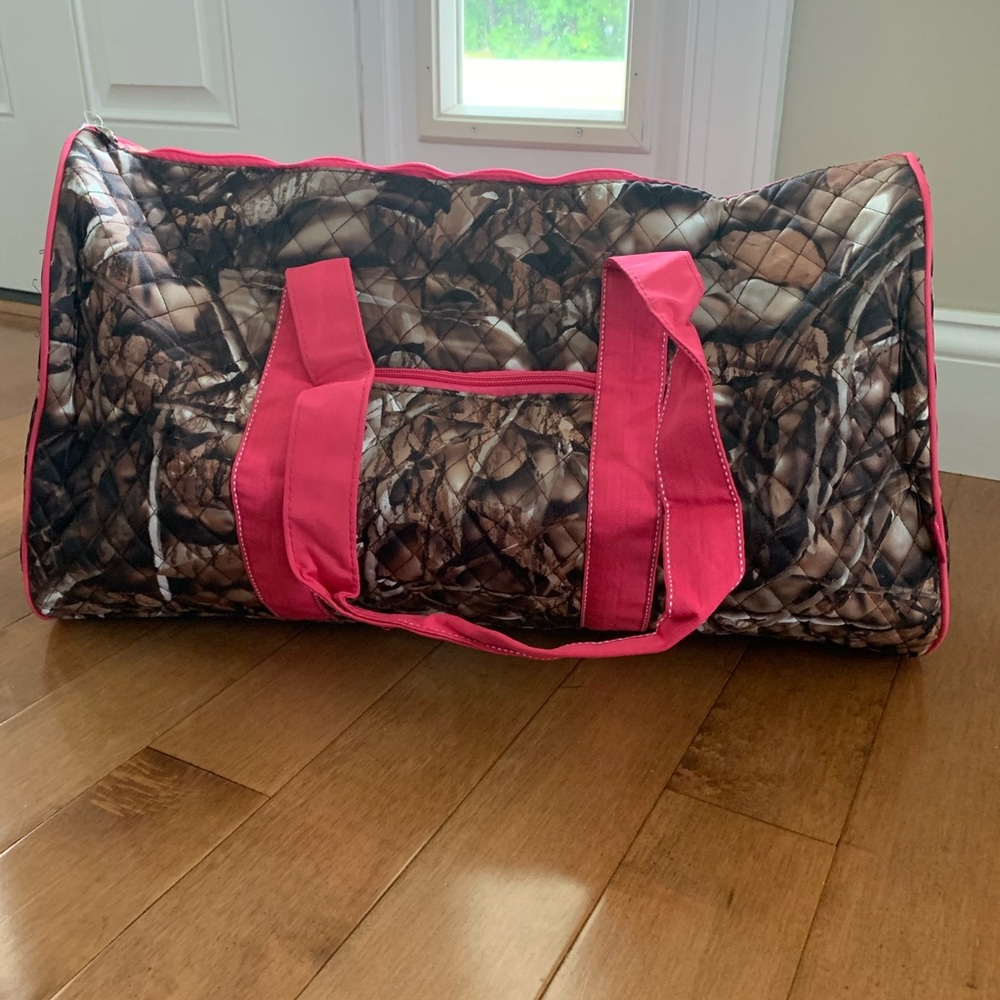 Ngil Camo w/hot pink straps 21" quilted duffle bag